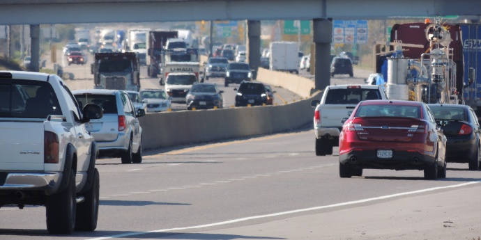 Interstate 70 traffic heading westbound approaching the I-64/U.S. 40/61 interchange in St. Charles County.