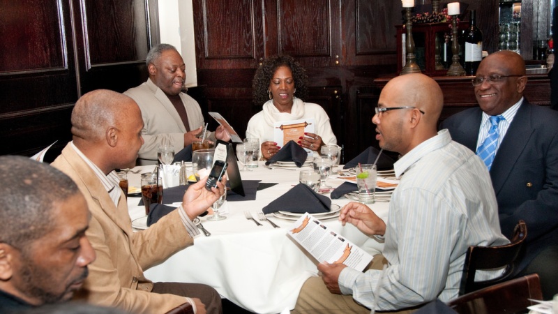 DBE conference attendees at table