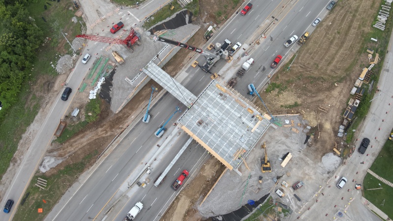 Ariel view of bridge under construction with most of the girders installed